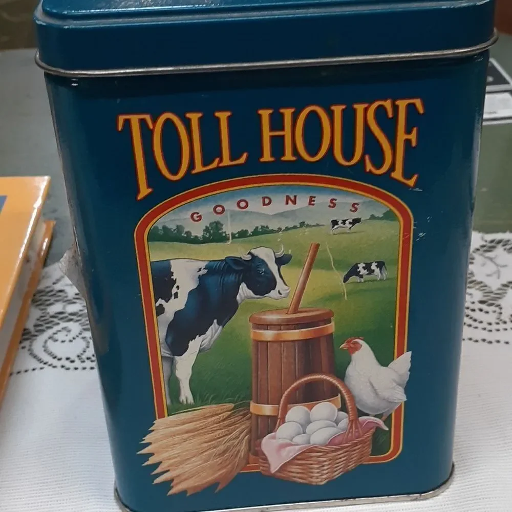 3-pc. Nestle's chocolate bundle: 2 vintage‎ tins and a hardcover cookbook
